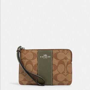 NWT Coach signature canvas wristlet
